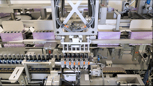 Hand Sanitizer being loaded into carton