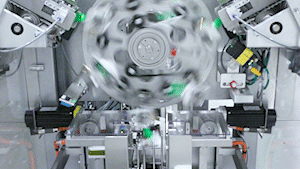 Sachets being loaded into a carton